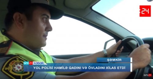 Yol polisi hamilə qadını və körpəsini xilas etdi 