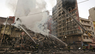 Bina yandı: 45 nəfər itkin düşdü
